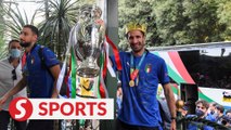 Victorious Italy football players return to Rome