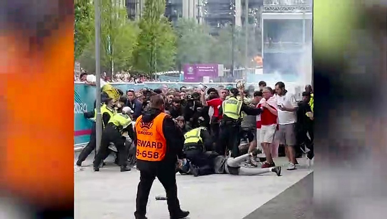 Moment football fans breach security barriers outside Wembley stadium ahead of Euro 2020 final between England and Italy