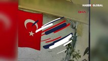 Adana'da iş yerine asılı Türk bayrağını koparıp çöpe attı
