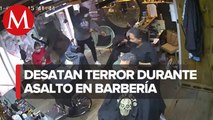 A plena luz del día, hombres armados asaltan barbería de Toluca