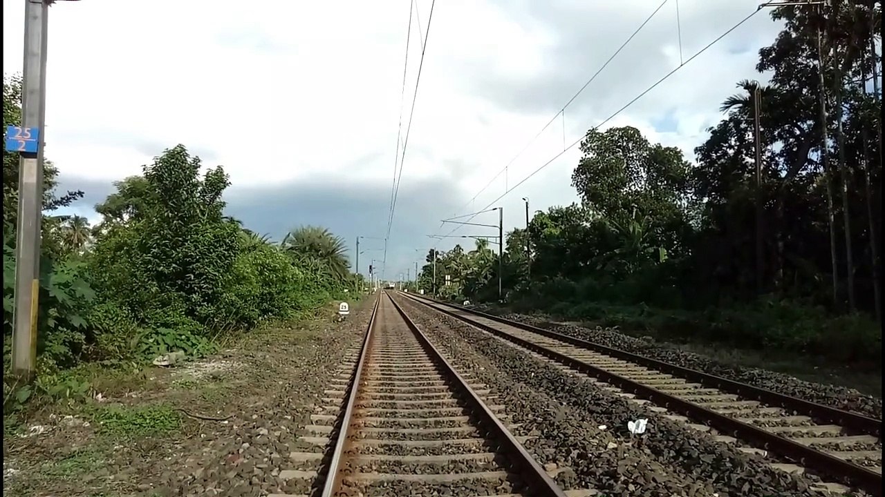 Twin WAP7+WAP5 locomotive leading Howrah-Maldatown Express toward Malda in a beautiful sunny day