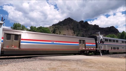 Amtrak Train Runs Through Crossing