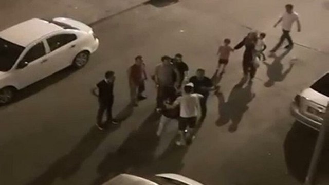 Şiddet uyguladığı eşinin arkasına saklanarak dayaktan kurtuldu