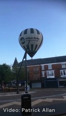 Hot air balloon crashes into town centre