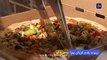 مطعم في قلب باريس يقدم للزبائن بيتزا محضرة آلياً على يد روبوت