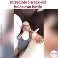 Incredible 5-week-old holds own bottle