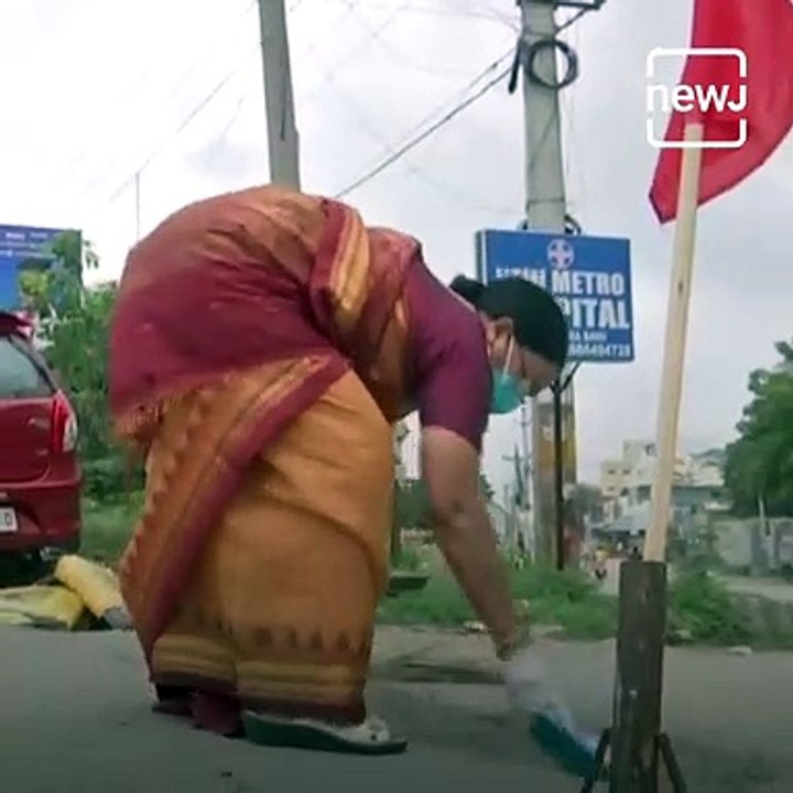 'Road Doctor' Couple Spends Pension Funds To Fill Potholes In Hyderabad