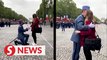'Marry me?' A Champs Elysees proposal moments before France's July 14 parade