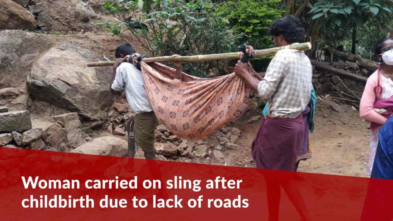 Woman bleeding after childbirth carried on sling to ambulance due to lack of roads