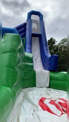 Kid Accidentally Front Flips Down Bouncy Slide