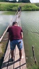 Slippery Bridge Sweeps Friend Off His Feet