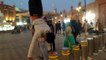 Guy Places His Hands Over Bollards and Performs Handstand Pushups in Busy Street