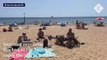 UK heatwave - Summer revellers flock to Bournemouth beach to enjoy the sun