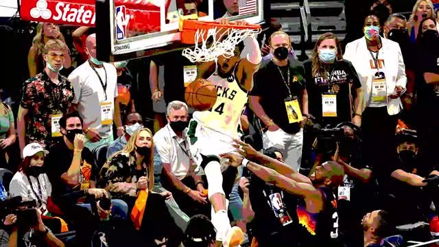 Holiday and Giannis - the play heard around the world