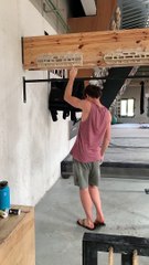 Rock Climber Practicing One Finger Hang