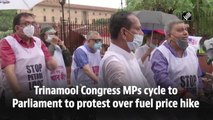 Trinamool Congress MPs cycle to Parliament to protest fuel price hike
