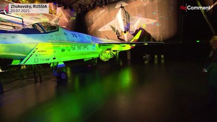 Russia unveils new war plane, Putin hails air power