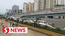 Cars pile up on roads after deadly floods in central China