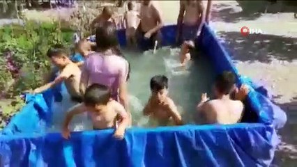 Traktör römorkunu havuza çevirdiler