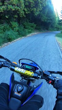 Motorcycle Rider Stops to Help Scared Deer Fawn