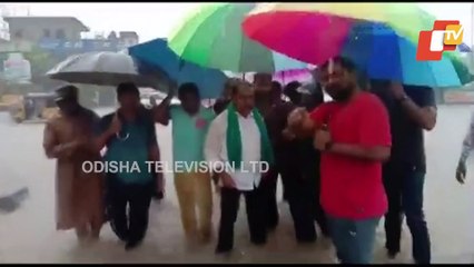 People Catch Fish On Telangana Flooded Roads
