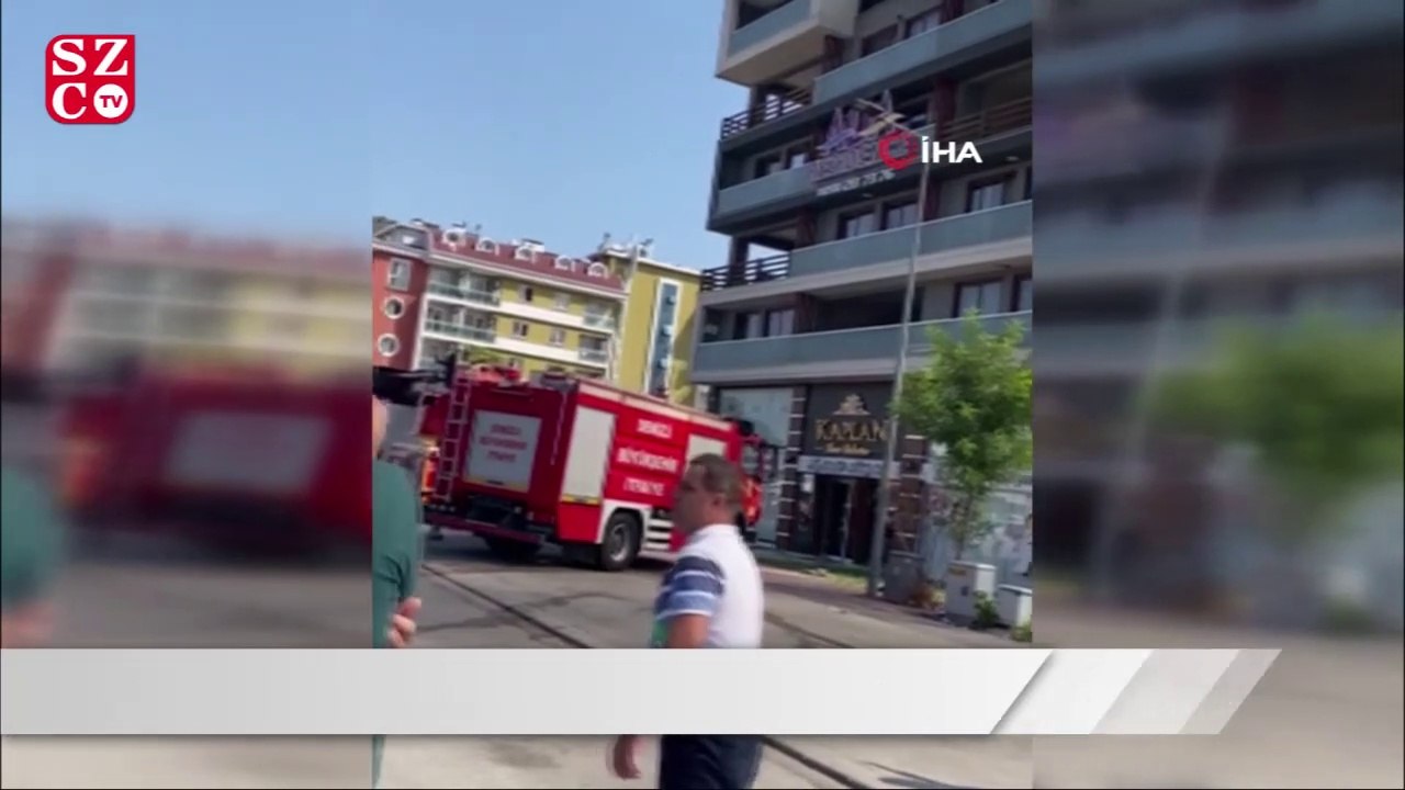 Yangında mahsur kalan adam, komşusunun balkonuna atladı