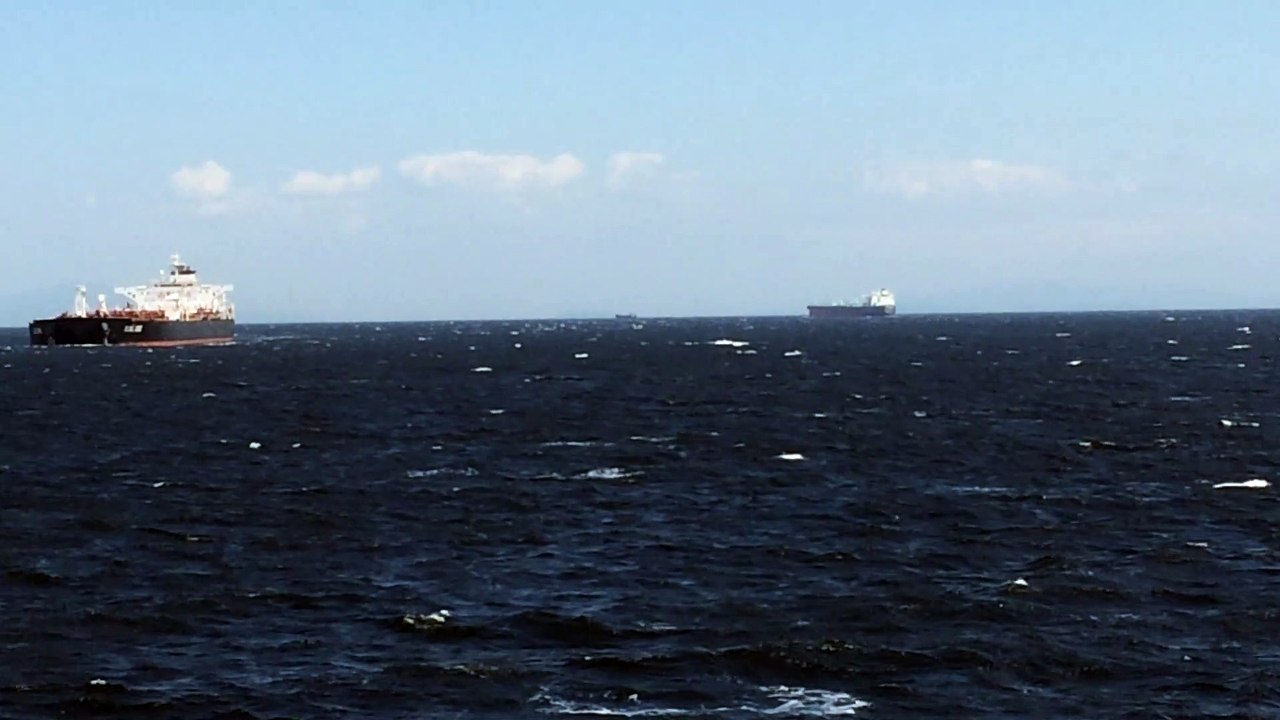 Giant cargo ship passing very close