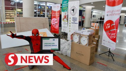 Spider-Man returns with food packets and stationery items at Ampang Hospital