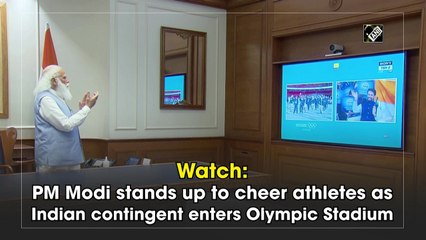 PM Modi stands up to cheer athletes as Indian contingent enters Olympic Stadium