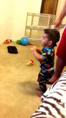Dancing to Mickey Mouses Hot dog song. Shaking his booty!