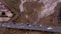 Floodwaters rushing in the North Valley Friday afternoon