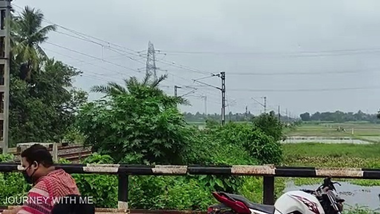 Almost stuck their heads with Barrier __ Busy People __ Gateman are in trouble __ Eastern Railway