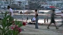 Marmaris'te halk plajında bir kadın ve bir erkek birbirine girdi!
