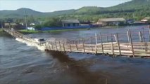 Se derrumba un puente en Rusia en el momento en el que lo cruza un imprudente conductor