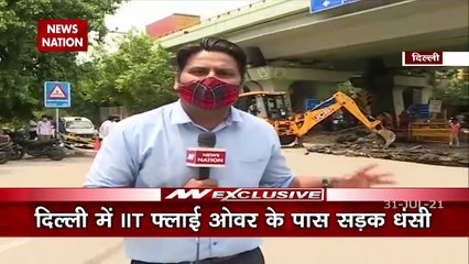Delhi : Large Section of road caves in under IIT Delhi flyover