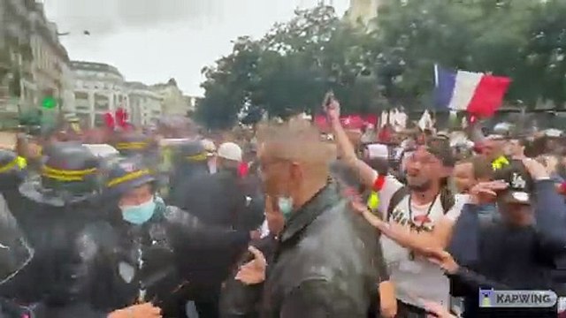 BREAKING: Crowd in France protests against Macron's mandatory COVID passport