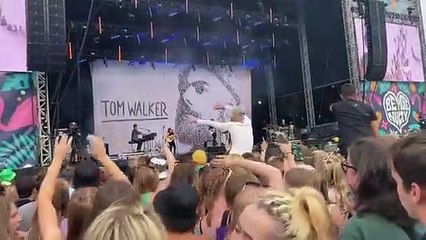 Woman proves crowdsurfing is not just for teenagers