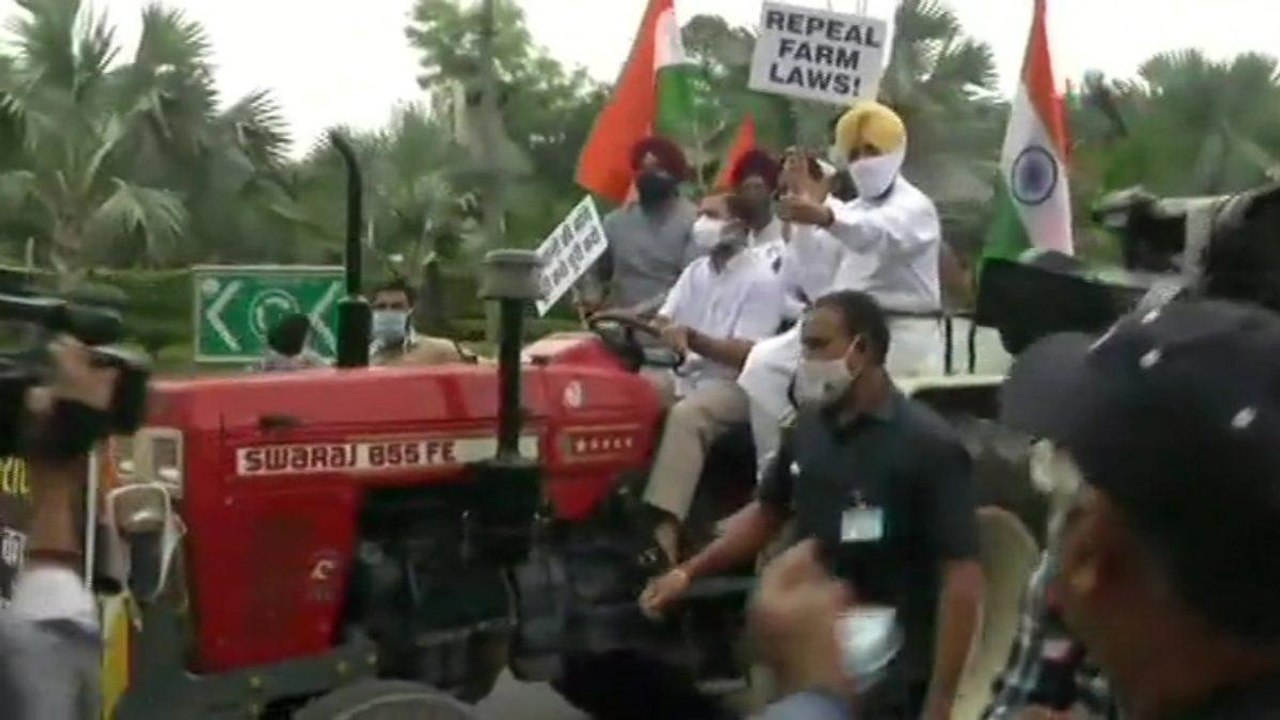 Rahul Gandhi drives tractor to parliament in fa...