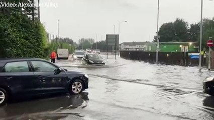 Heavy rains cause flooding on London streets