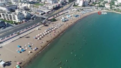 Plajlar bayram tatilinde doldu taştı