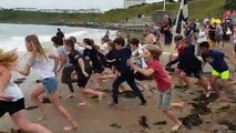 St Martin's School leavers enjoy their school leavers dip in North Bay, Scarborough