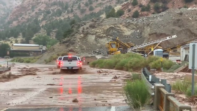 Flash flooding sweeps over roads
