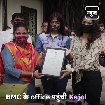 Watch Kajol Devgn's Sweet Gesture As She Distributes Raincoats To BMC Workers