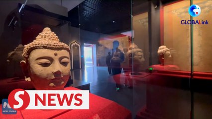 Repaired ancient frescoes, statues attract tourists in NW China