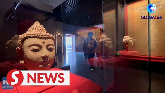 Repaired ancient frescoes, statues attract tourists in NW China