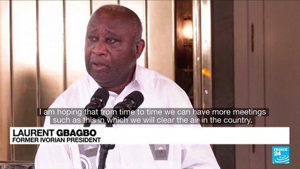 Conflict 'behind us', Ivory Coast's Ouattara says after greeting rival Gbagbo