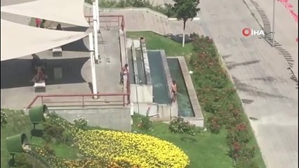 Karabük'te çocuklar süs havuzunda serinledi