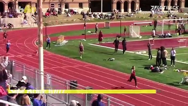 Check Out This Super Fast Dog Catch Up to the Front of This High School Track Race!