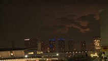 Lightning flashes above Olympics site in Tokyo