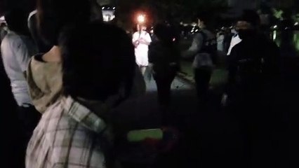 A 53-year-old woman with a water gun on three torch   聖火ランナーに水鉄砲で液体をかけた53歳の女